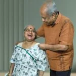 Zyenika Amjaa Back Open Mom Dad Front Smiling