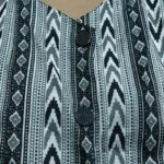 Zyenika Kunja Front Open Button Close Up